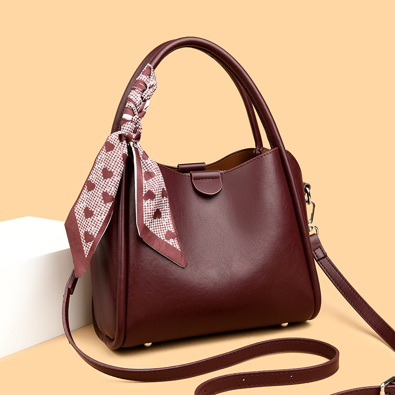 Elegante borsa a secchiello da donna con tracolla e manico_voghion.com