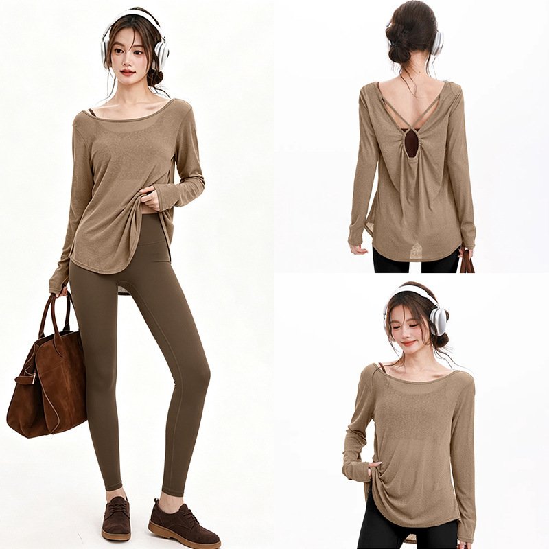 Fitness girl loose yoga outfit, stylish sports cover-up with a beautiful back design, long-sleeved top for running and training, creating a relaxed and comfortable look Fitness girl loose yoga outfit, stylish sports cover-up with a beautiful back design, long-sleeved top for running and training, creating a relaxed and comfortable look