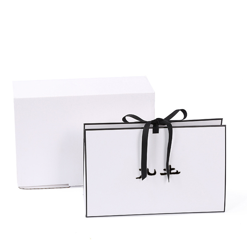 现货蝴蝶结白卡纸袋 通用包装购物服装袋 广告礼品手提袋批发