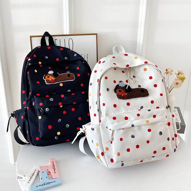 Nueva pequeña mochila fresca simple de moda para estudiantes de primaria y secundaria de gran capacidad mochila de viajes casuales mochila