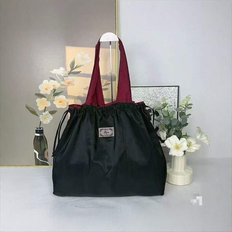 Large-capacity drawstring backpack for women, lightweight Oxford cloth tote bag for grocery shopping, commuting, travel, and foldable storage