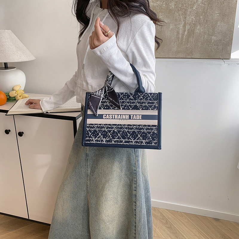 Bolsos de celebridades de Internet para damas 2025 nuevo bolso portátil de moda Bolso de compras de gran capacidad para viajes diarios
