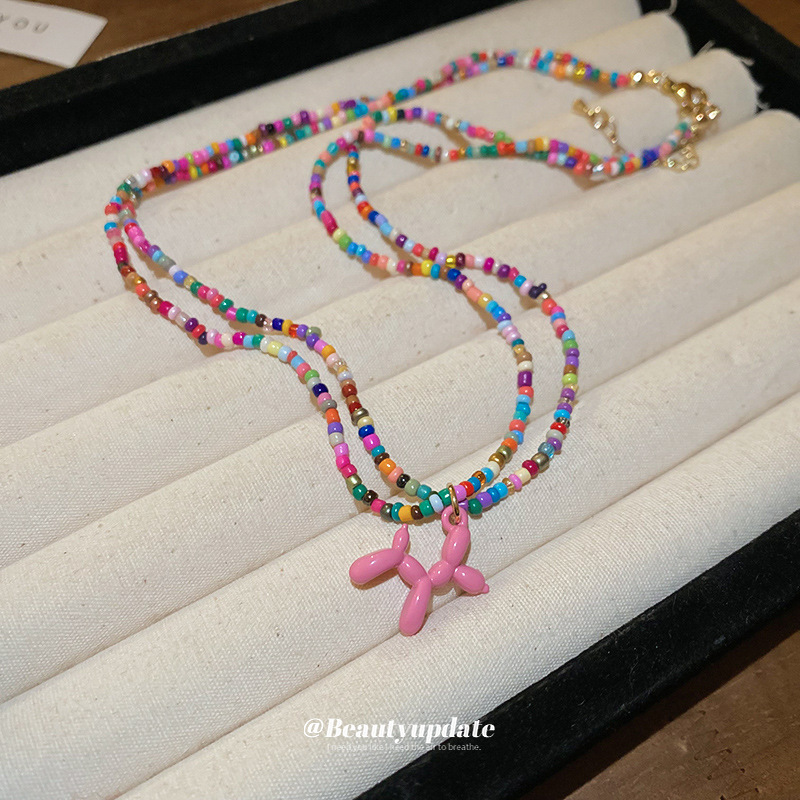 Collar colgante de cuentas de arroz para cachorros de dopamina de verano de acero de titanio, cadena de clavícula de temperamento de viento dulce y fresco, collar de sentido avanzado de nicho