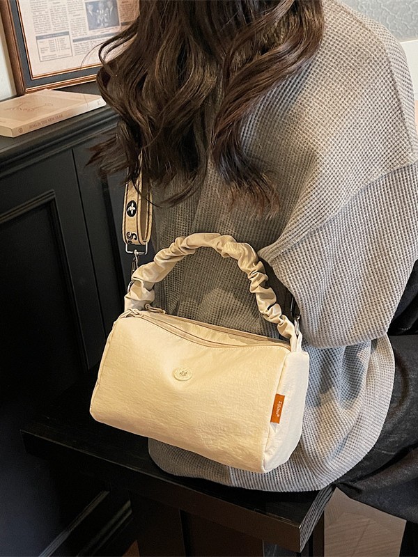Bolso de tela de nylon de moda para mujeres 2026 nuevo estilo coreano bolso pequeño de tendencia nicho de diseño plegable bolso de mano image 4