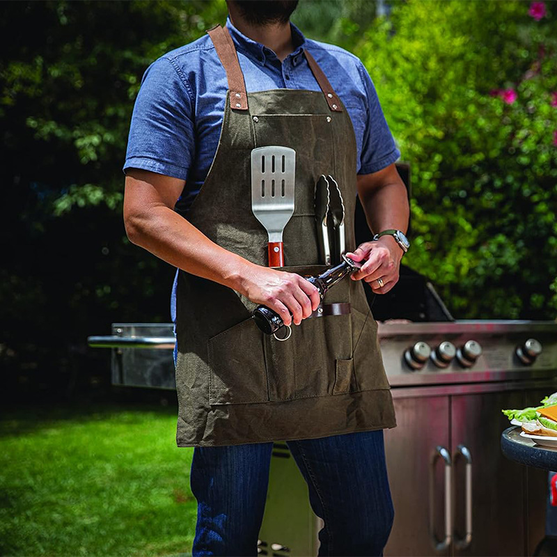 Nuevo delantal de lona gruesa transfronterizo, ropa de trabajo floral de barbacoa al aire libre, herramientas de jardín, delantal de almacenamiento, fábrica al por mayor
