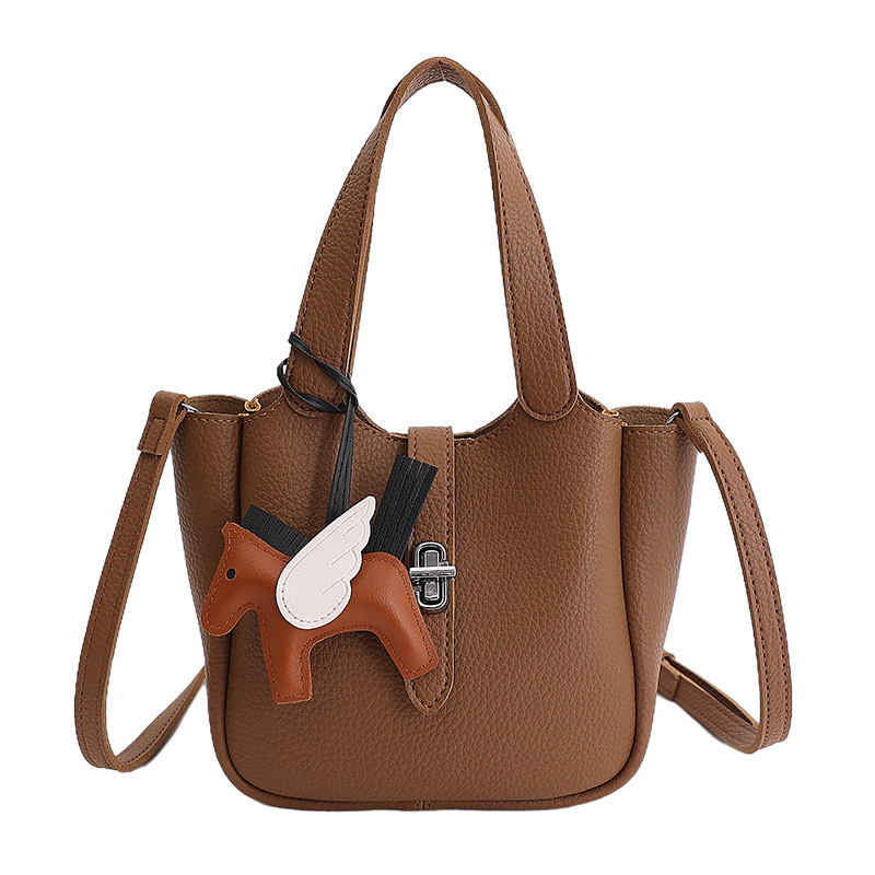 Bolso para mujeres 2026 venta caliente nuevo nicho coreano bolso de cubo portátil de textura alta moda lujosa bolsa de mochila