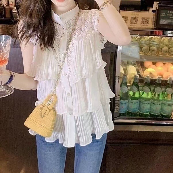 Beautiful white pleated hollow-out sleeveless chiffon shirt women's new design sense niche chic ruffled top