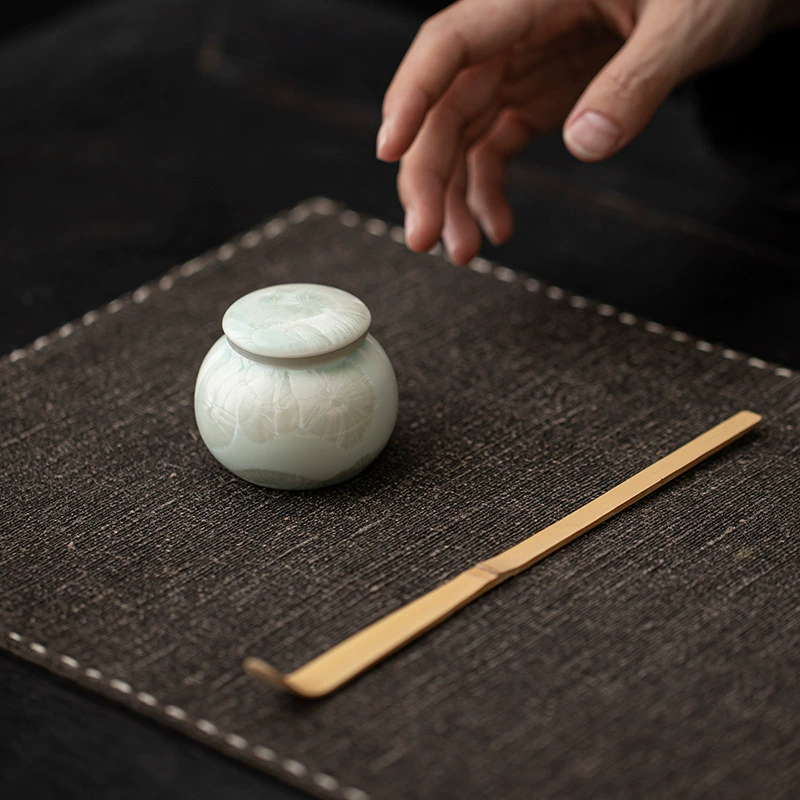 Small storage box, storage system, ceramic tea set with accessories