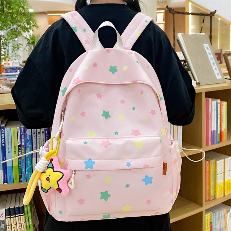 Nueva pequeña fresca mochila de estudiantes de secundaria alta capacidad de impresión ligera mochila de dibujos animados mochila de viaje