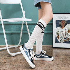 Striped women's mesh hollow knitted spring and autumn mid-length calf socks autumn Internet celebrity thin D family letter socks ins trend