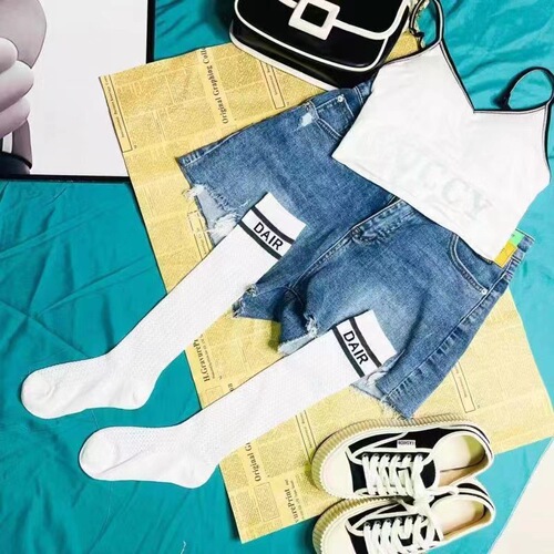 Striped women's mesh hollow knitted spring and autumn mid-length calf socks autumn Internet celebrity thin D family letter socks ins trend
