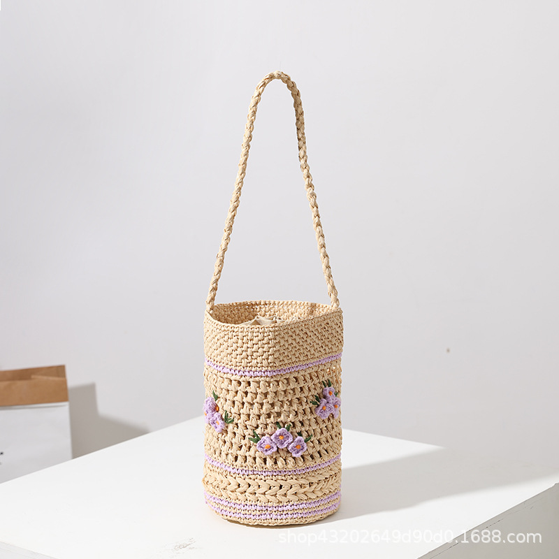 拉菲草刺绣草编包新款丁香花手提水桶草包编织包海边度假沙滩包