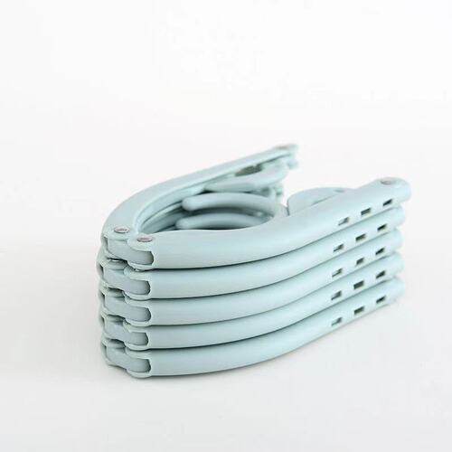 Internet celebrity folding clothes hanger travel portable clothes hanger business trip magic clothes hanger wholesale men and women clothes drying pole 