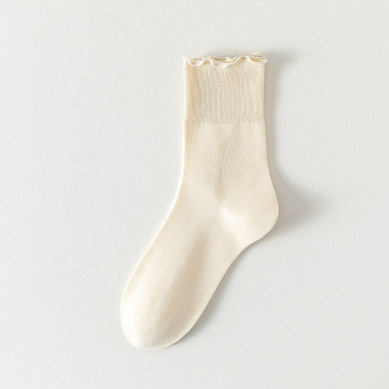 Calcetines de algodón de color sólido para mujeres verano en una máquina sin costuras de hueso envasado independiente calcetines de mujer al por mayor