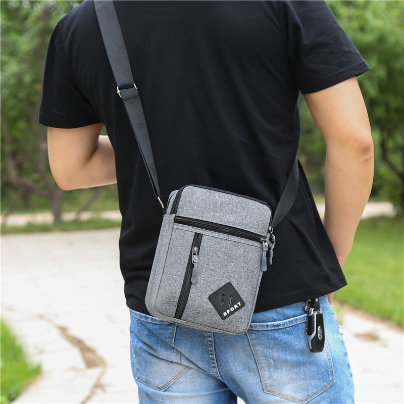 Bolso de pecho simple de tela Oxford al por mayor de fábrica, bolso de hombro informal para exteriores transfronterizo para hombre, nuevo bolso cruzado portátil para hombre