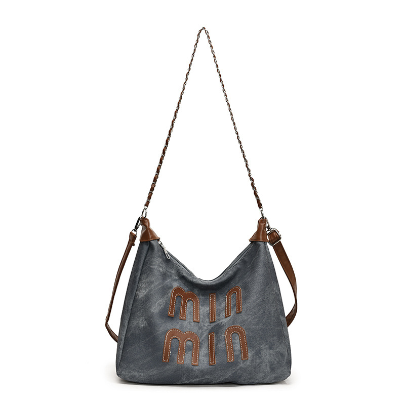 Bolsa de hombro coreana retro para mujeres otoño / invierno 2024 nuevo bolso de brazo de moda casual portátil personalidad textura mochila