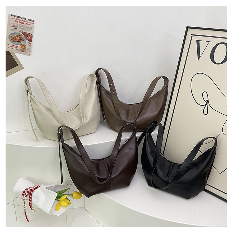 New women's shoulder bag, simple retro style small bag, dumpling bag, high-end texture, versatile commuting crossbody bag_voghion.com