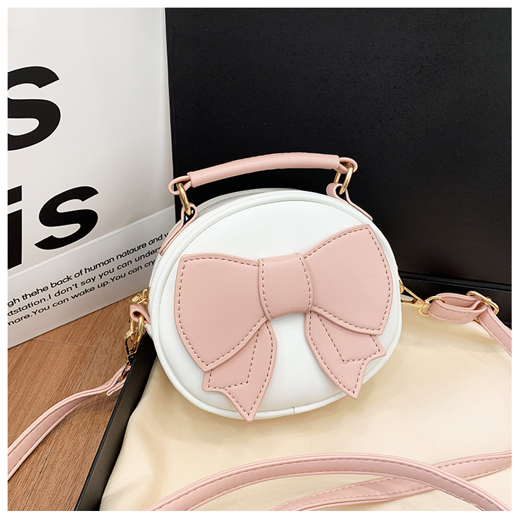 151g Weight Polyester Lining Material Zipper Closure Type Top Handle, Sling Strap Strap Type Crossbody Bag Bags Type Casual, Daily, Shopping Occasion Pu Leather Material Bow Knot Pattern All Seasons Season Girl'S Gender Cute Style Round Shape Girl'S Pu Leather Bow Knot Cute Round Zipper Crossbody Bag 15