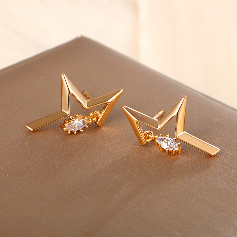 Xuping joyería de aleación estereoscópica estrella simple pendientes de orejas personalidad femenina alta sensación de moda auriculares al por mayor
