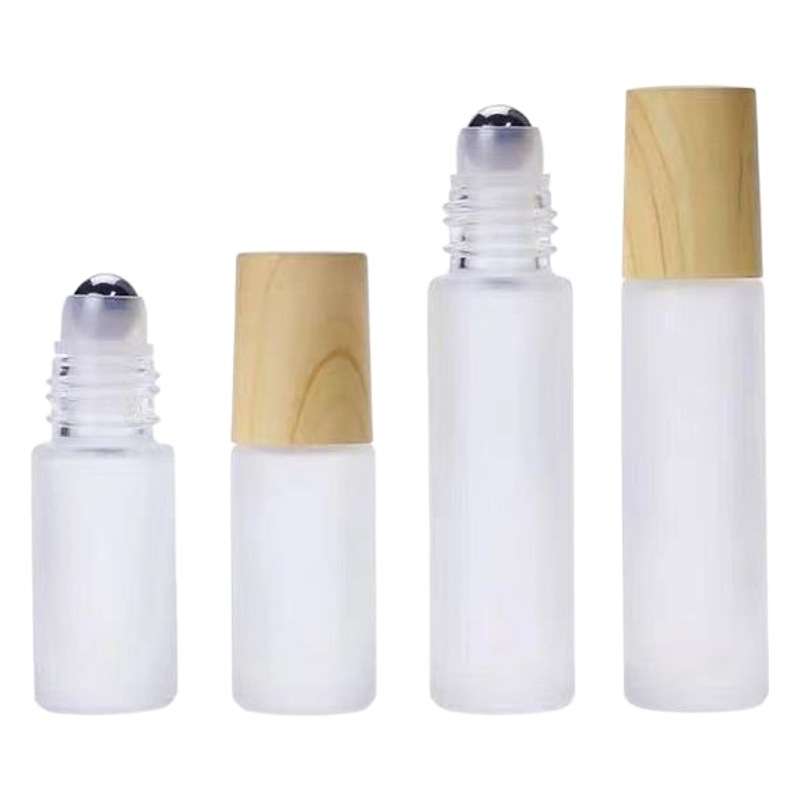 Cubierta de grano de madera botella de rodillo botella de aceite esencial de vidrio esmerilado 5ml10ml cosmético sub-embalaje botella de cuentas pequeña botella de muestra al por mayor