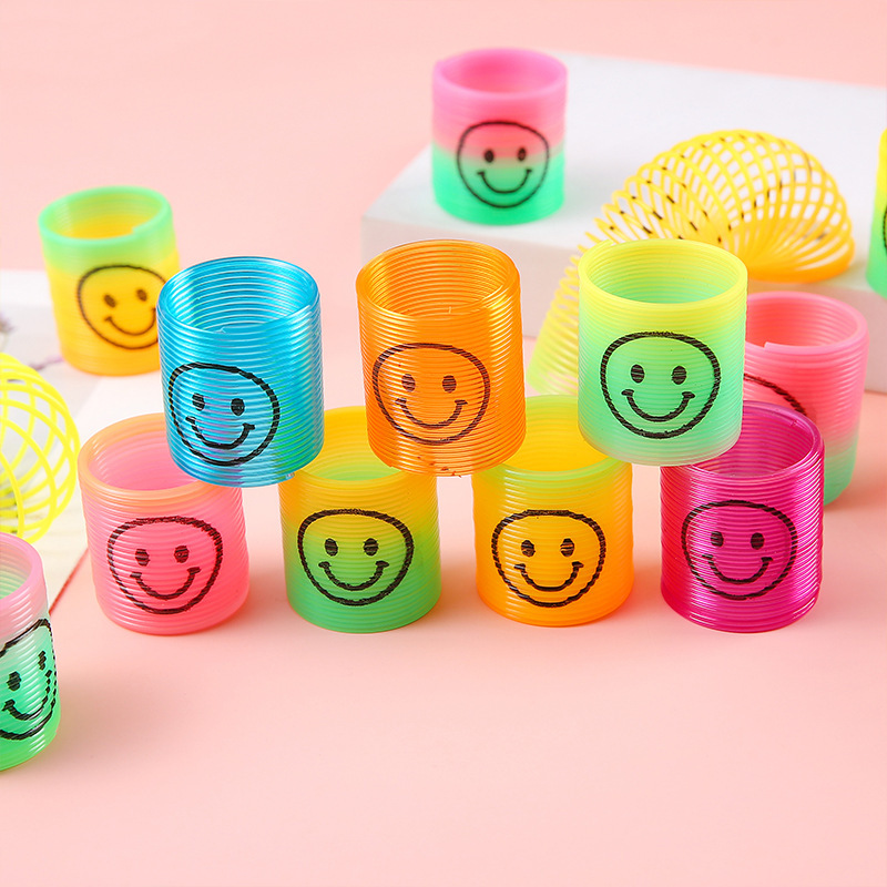 子供の多彩なスプリングサークルのミニ笑顔虹の輪の七色の輪の弾力の輪の露店の賞品の幼稚園の贈り物は遊びます。|undefined