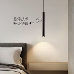 北欧の非常にシンプルな寝室のベッドのシャンデリア現代のシンプルなリビングルームの背景の壁の吊り線のスポットライトの円柱の長い筒の小さいシャンデリア