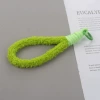 Plush green lanyard with round buckle
