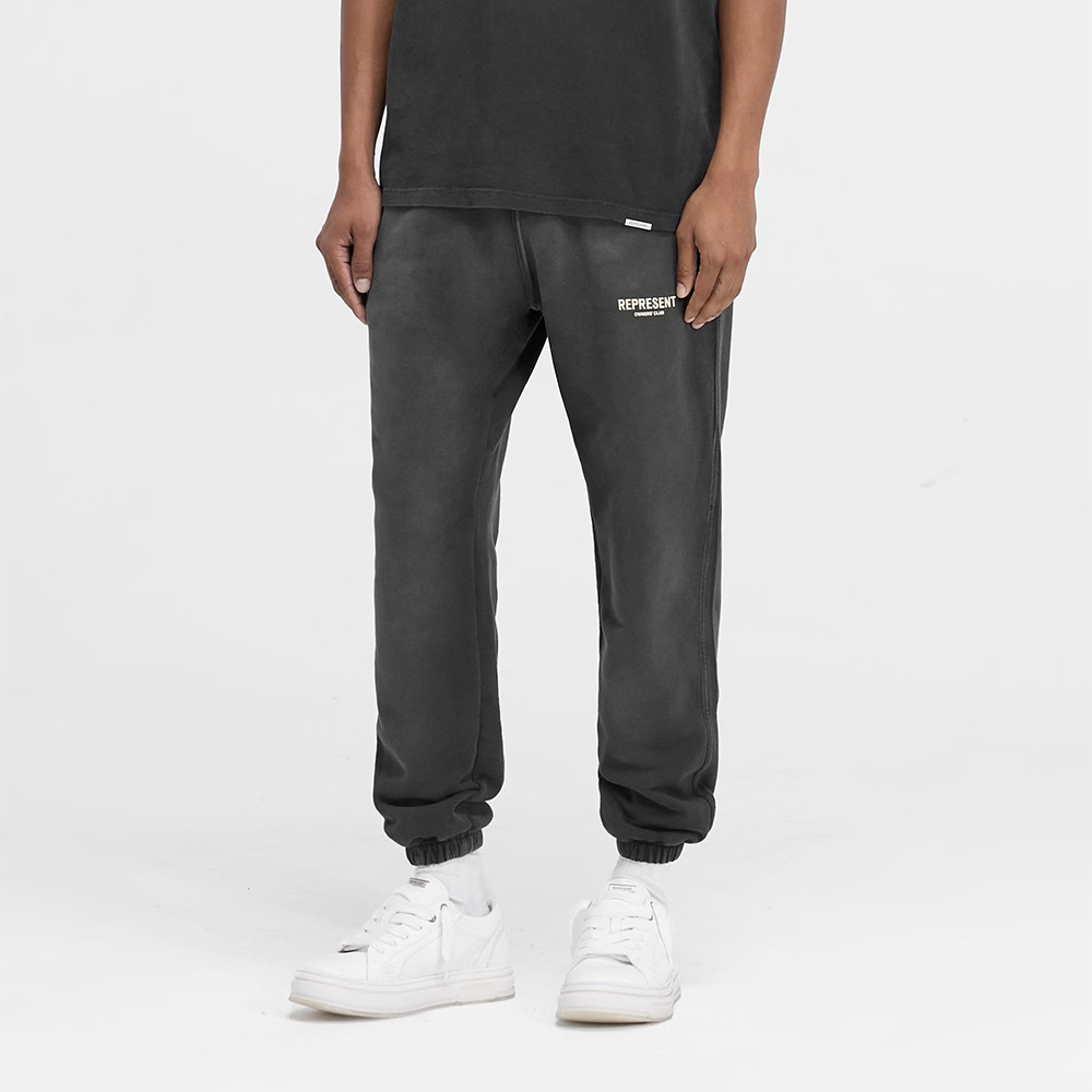 Representa pulverización de caballo para hacer viejas letras de lazo de lazo de pie pantalones sueltos para hombres y mujeres callejero pantalones de pies pequeños transfronterizos