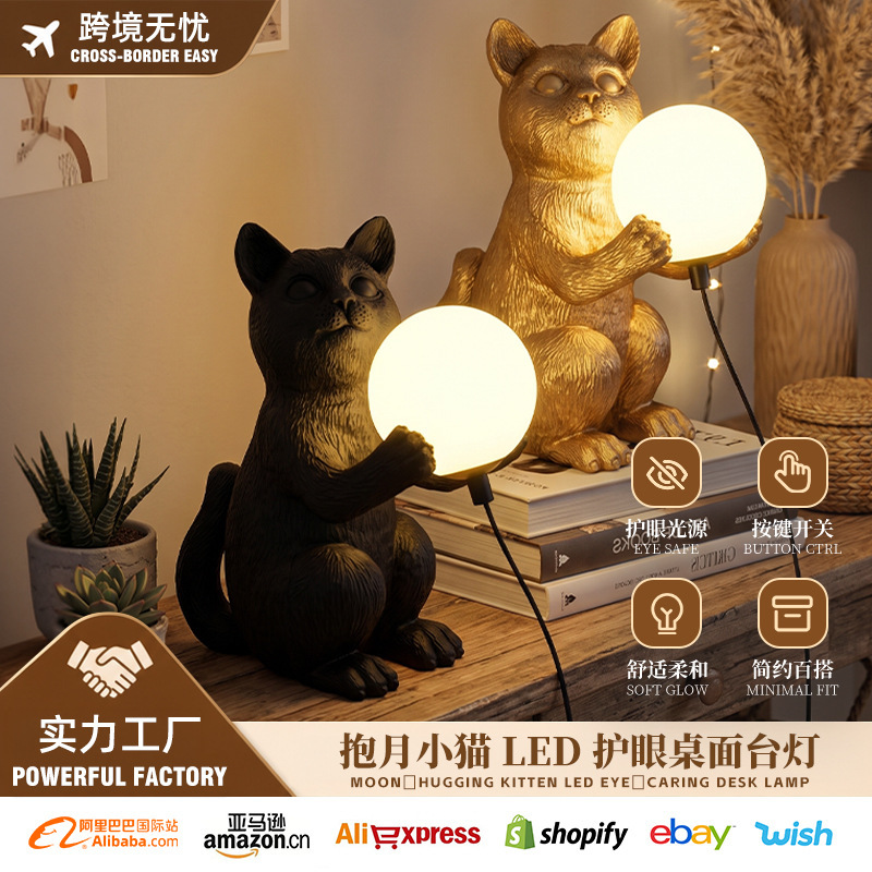 Creative cat holding a ball table lamp, resin craft decorative table lamp, study room desktop ambient small table lamp