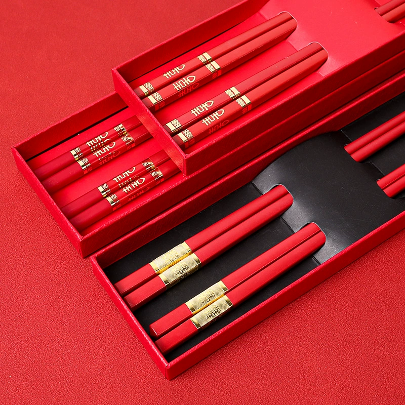 Новые бытовые красные свадебные палочки для еды из сплава оптом Национальный прилив Праздничный сопровождающий подарок Нескользящие подарочные коробки для новоселья