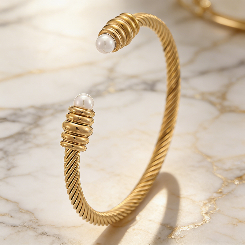 Brazalete de acero inoxidable torcido perla abertura europea y americana nicho femenino simple diseño brazalete de alambre joyas al por mayor image 1