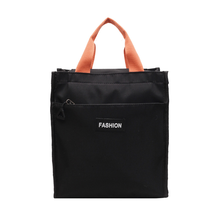 Moda coreana nueva serie de gran capacidad bolsas escolares portátiles de otoño 2024 bolsas de botellas impermeables Oxford