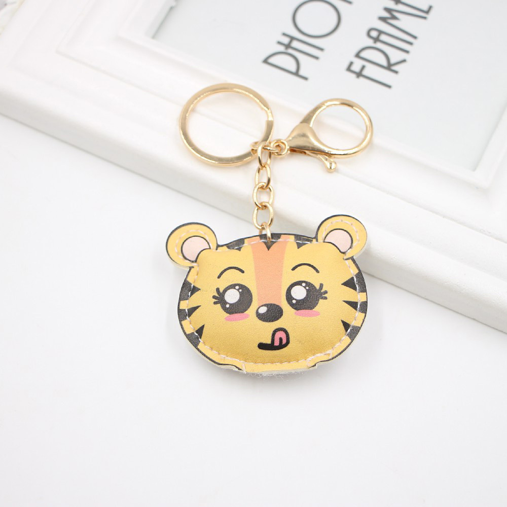 Hotselling cute tiger pu leather schoolbag exquisite gift bag pendant keychain activity small gift small hanging videopicture3