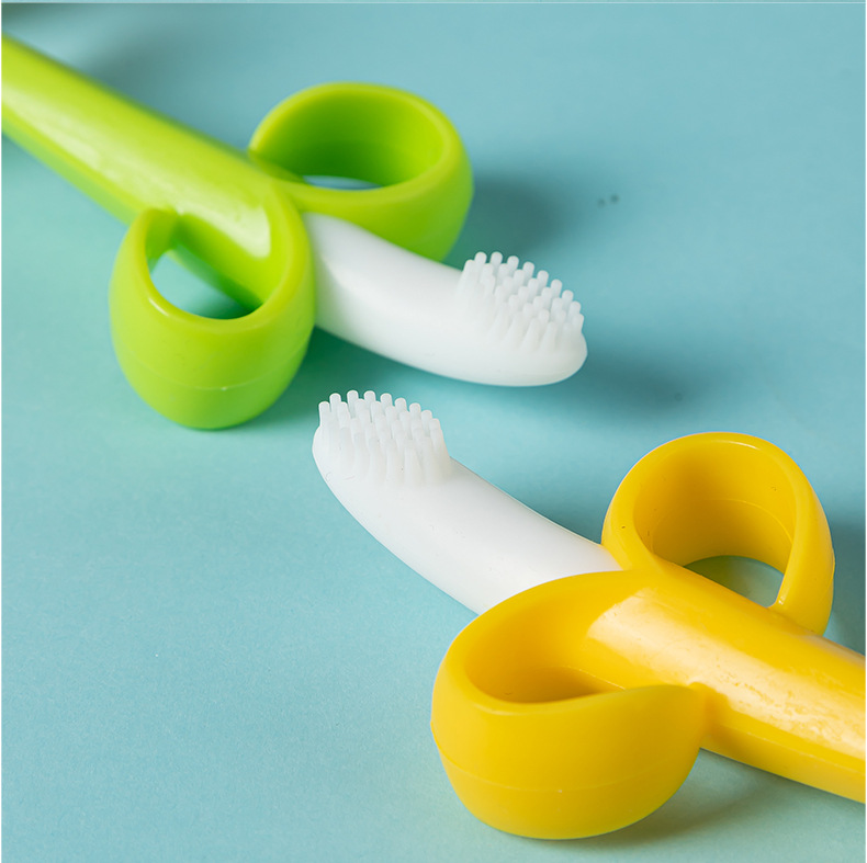 Silicone de grado alimenticio estereoscópico banano diente de goma de diente para bebés dientes de leche de goma de goma de pulsera banano cepillo de dientes