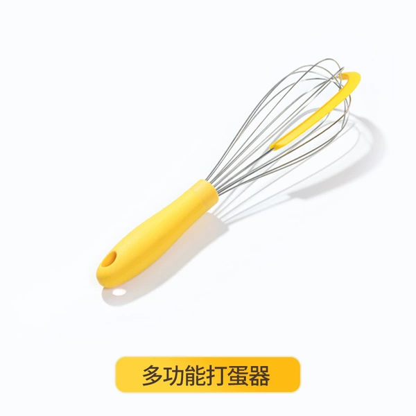 Yellow handle egg beater