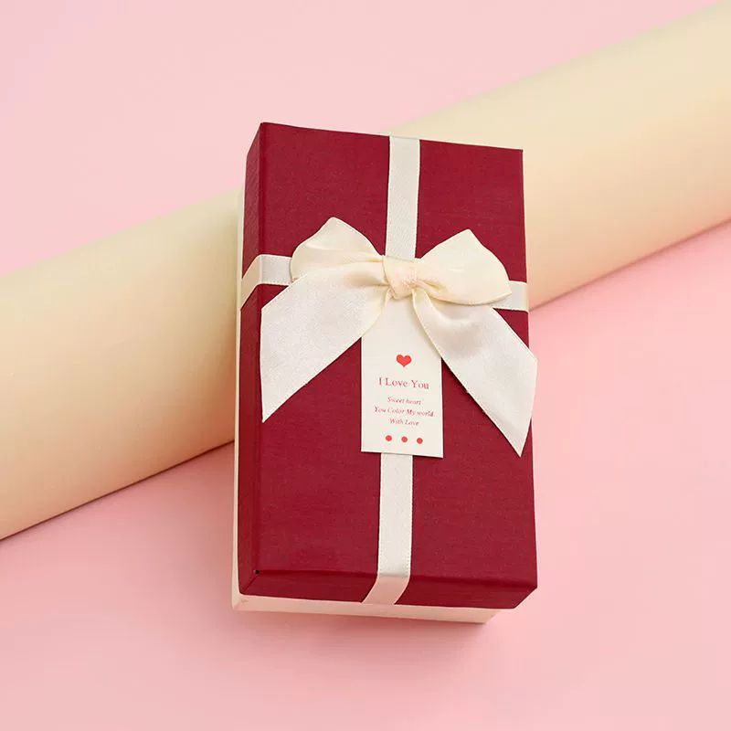Rectangular lipstick with bow, cosmetic perfume, gift box