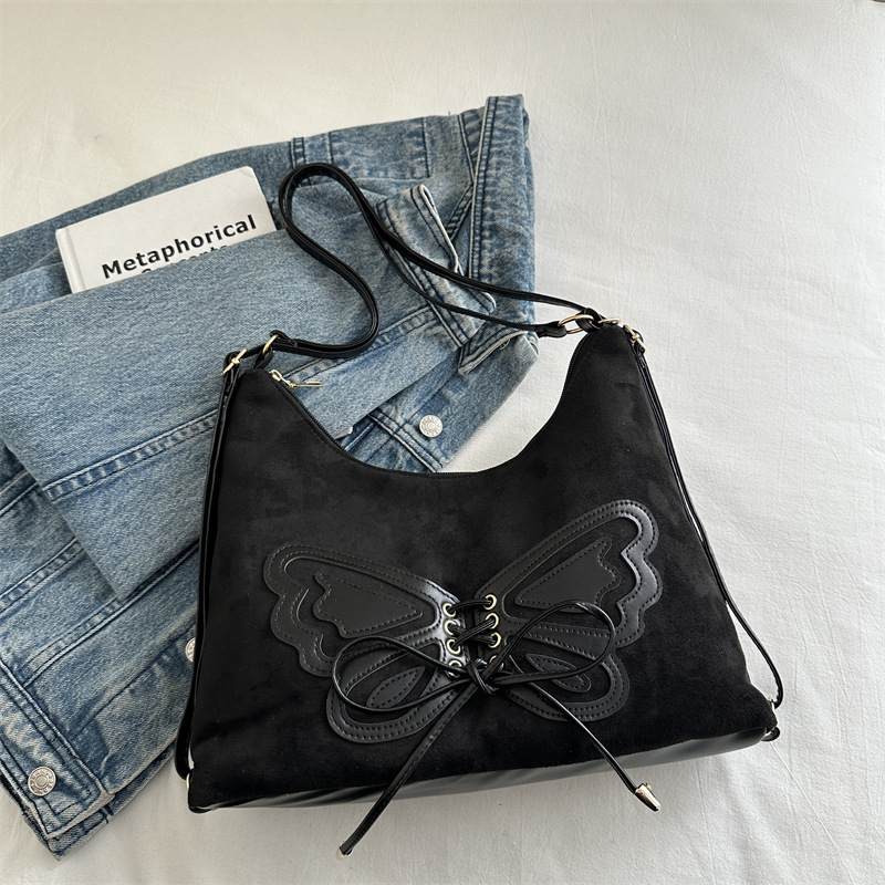 Bolsa de viaje retro ocio de otoño y invierno de 2024 nueva bolsa de hombro mariposa axillar multicapacidad de mochila