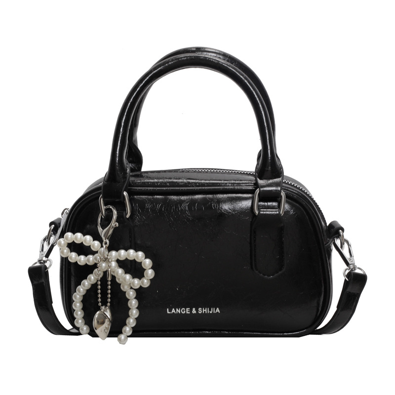 Bolso de mano de alta textura versátil verano 2024 nuevo bolso de mujer estilo extranjero versátil bolso de hombro bolso de viaje