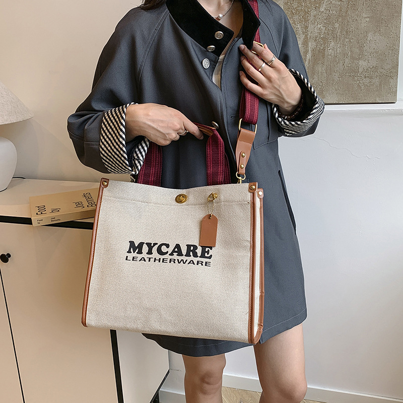 Gran capacidad de viaje al trabajo bolso de mano para mujeres 2024 nuevo lino retro color contraste mochila de hombro