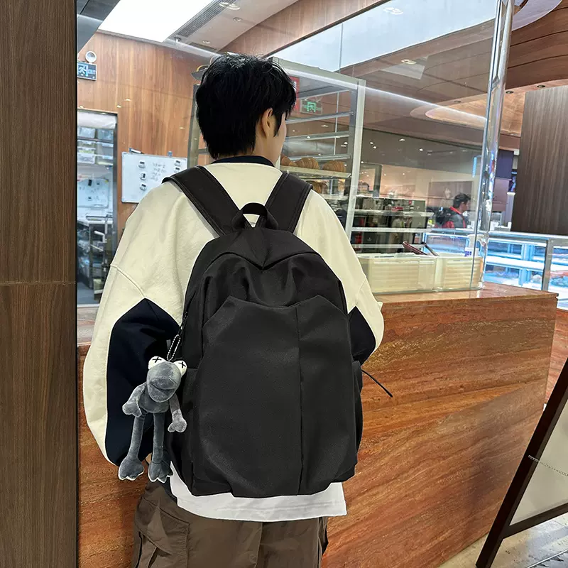 跨境新款休闲双肩包大容量简约潮酷电脑背包男女中大学生纯色书包