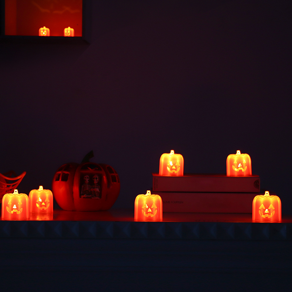 Nuevo Halloween calabaza lámpara fantasma día de decoración props demonio expresión pequeña lámpara de noche LED vela lámpara de mesa al por mayor