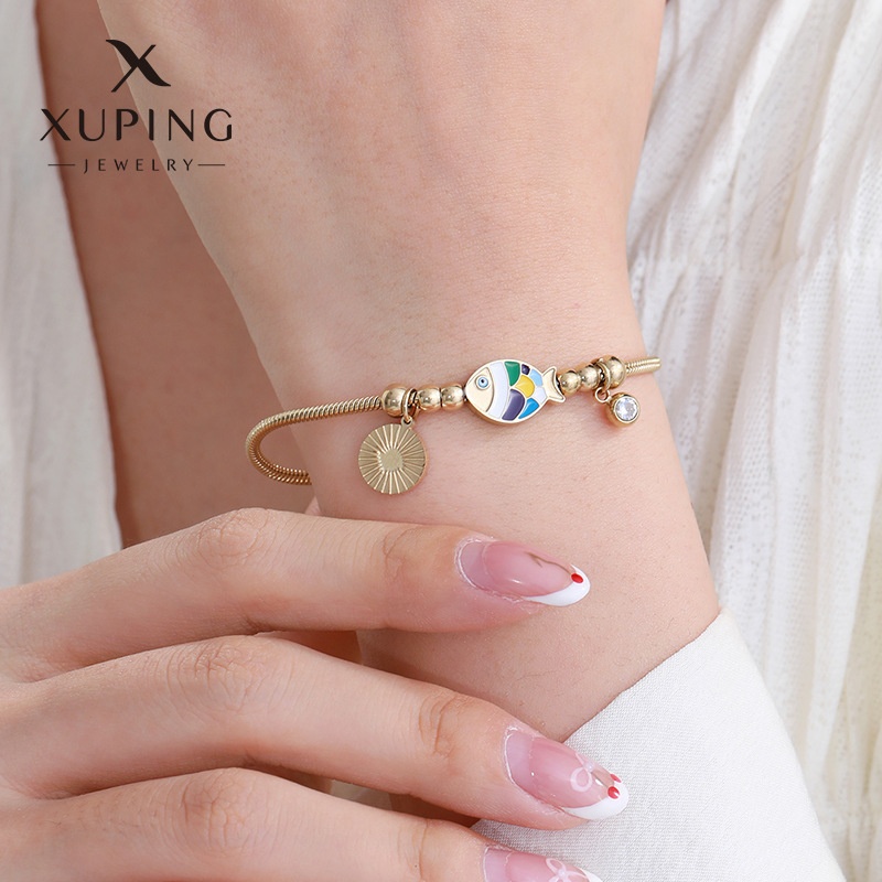 Xuping joyería colorido goteo de aceite pez dorado bordilla columna de hueso de serpiente chapado 14 quilates de oro cruzado Europa y América pulsera de acero inoxidable