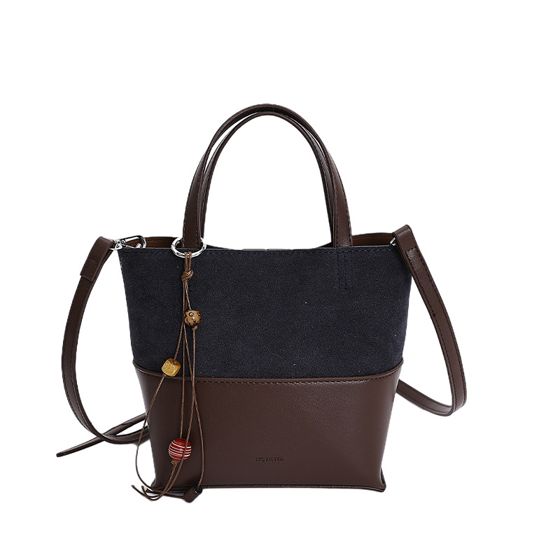 Bolso de moda transfronteriza retro bolso de cubo de agua mujer otoño y invierno 2025 nuevo estilo versátil bolso de hombro de viaje