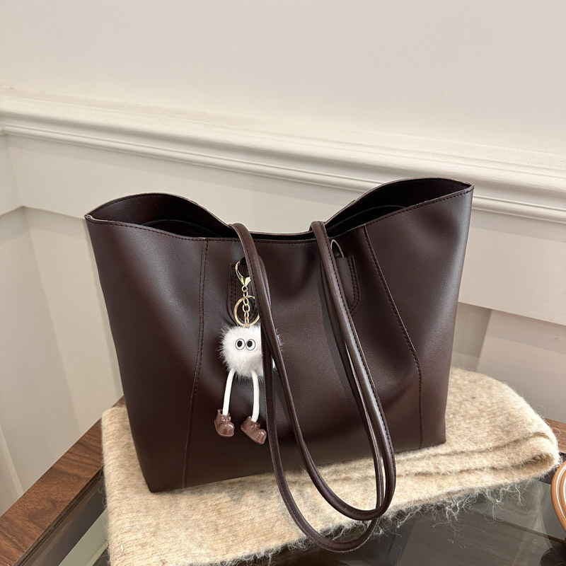 Bolsa de mano de textura de viaje casual otoño / invierno 2024 nuevo estilo coreano simple bolso de hombro axilar temperamento bolso especial