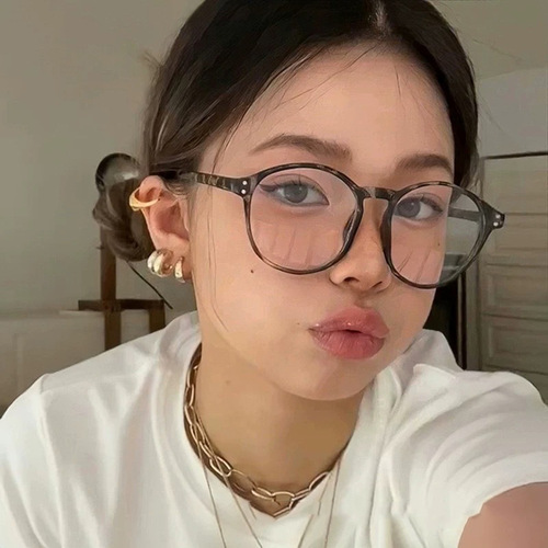 Round glasses frame with beige-colored rice grain design, suitable for natural makeup and large faces, unframed glasses, trendy for fashionable women and internet influencers.