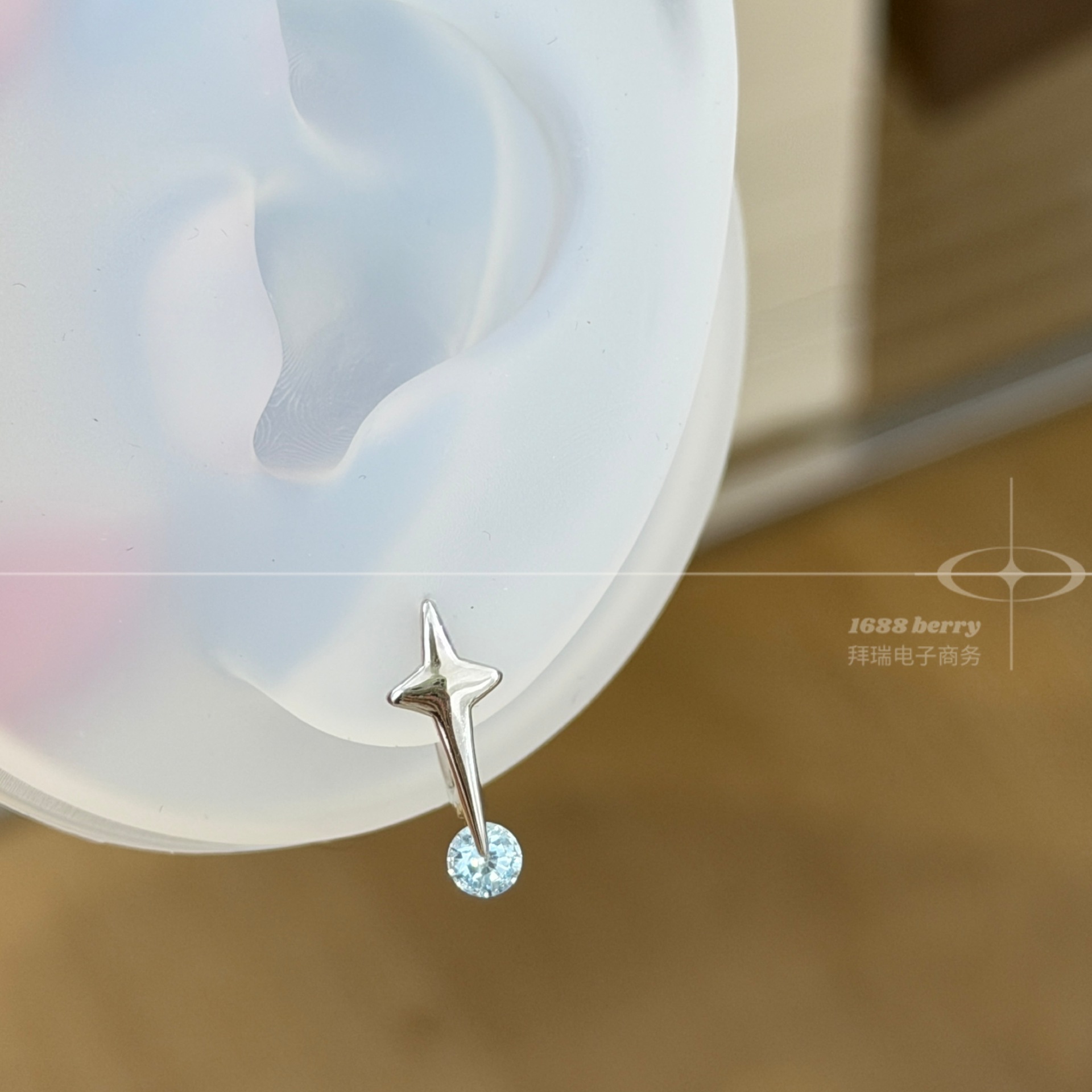 Korean-style star-shaped round zirconia earrings with a rotating design, featuring a four-pointed star motif, versatile and elegant earrings
