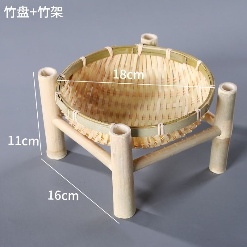 手作りの竹の編み製品の小さい竹のかごの丸い棚は箕のホテルのレストランの間食の果物のお菓子の皿のマントーのかごを振りかけます。|undefined