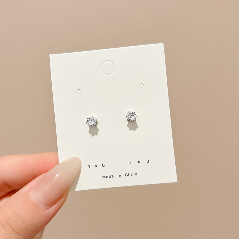 Pendientes de aro lisos para mujer, lujo ligero, pendientes de alta gama, pendientes populares, aretes de diseño exclusivo, aretes de otoño e invierno al por mayor