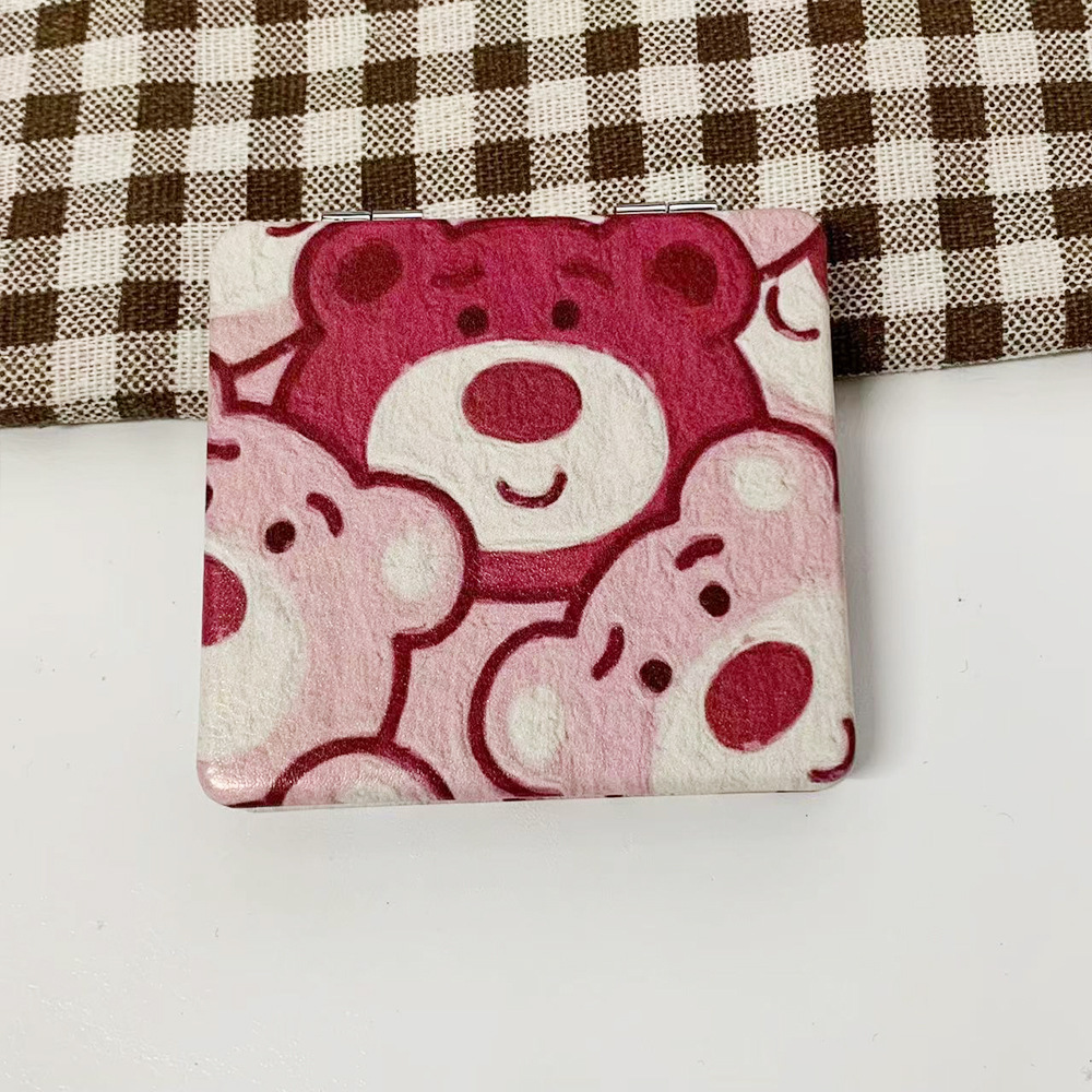 Nuevo perro Pacha osos de fresa doble cara plegable espejo de maquillaje tienda en línea tienda de espejo pequeño fábrica al por mayor