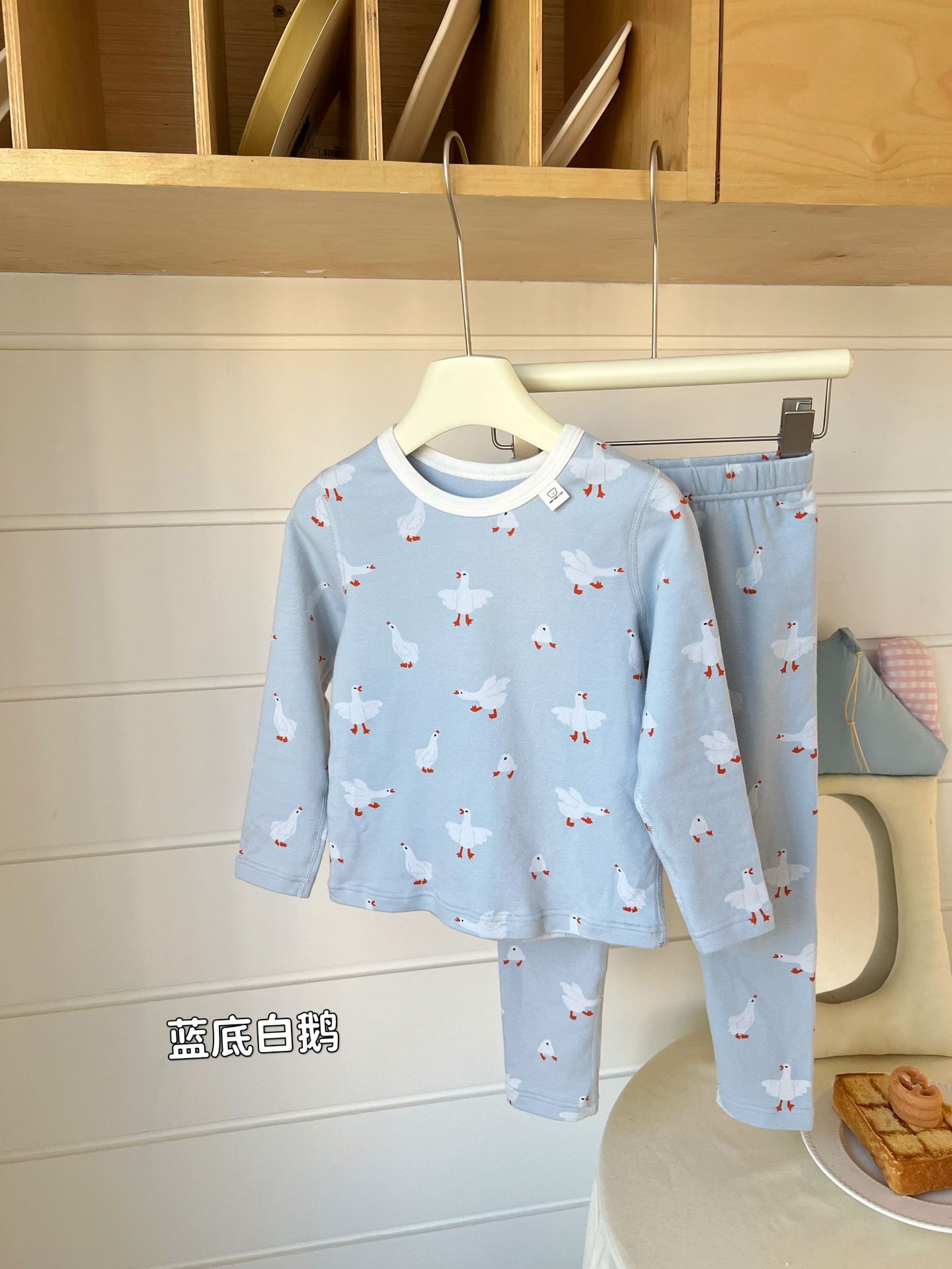 White goose on blue background